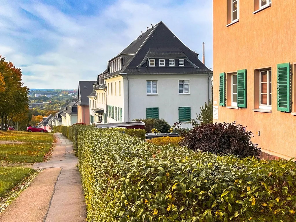 Exklusives Wohnen auf dem Pfarrhübel: Großzügige 3-Zimmer Wohnung mit besonderem Flair