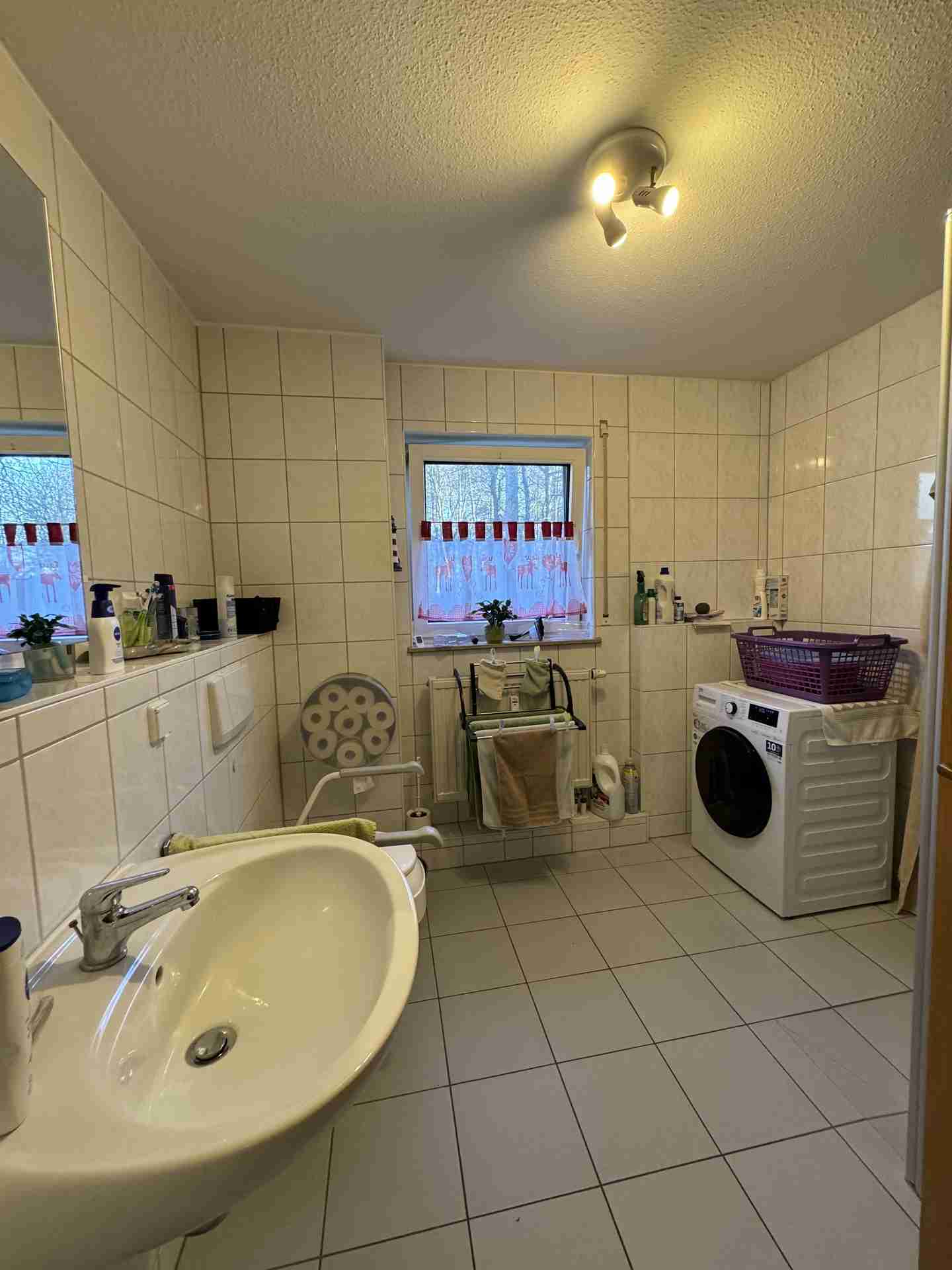 Vermietete 3-Zimmer-Erdgeschosswohnung mit Terrasse und Tiefgaragenstellplatz – ideal für Kapitalanleger